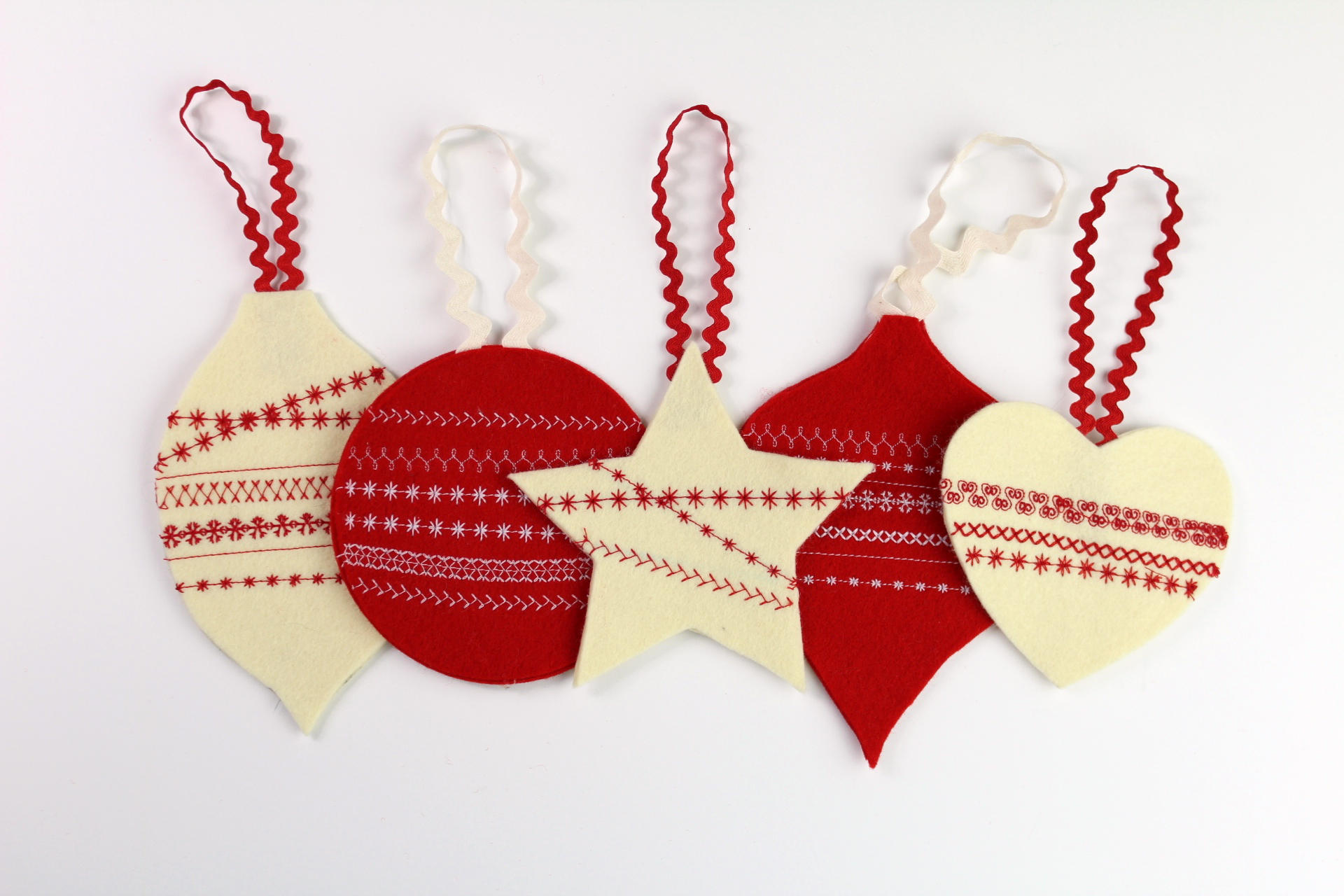 Finished felt ornaments side-by-side.